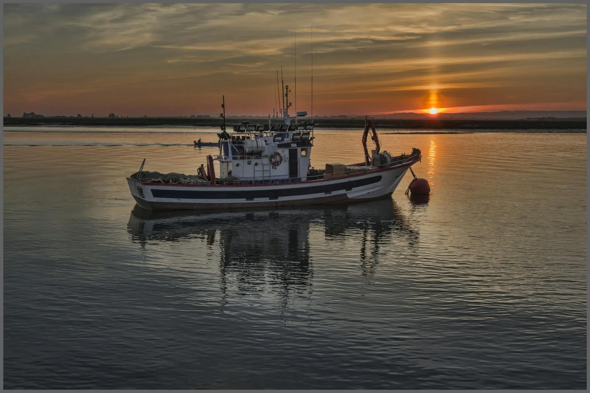 boat on body of water during day time